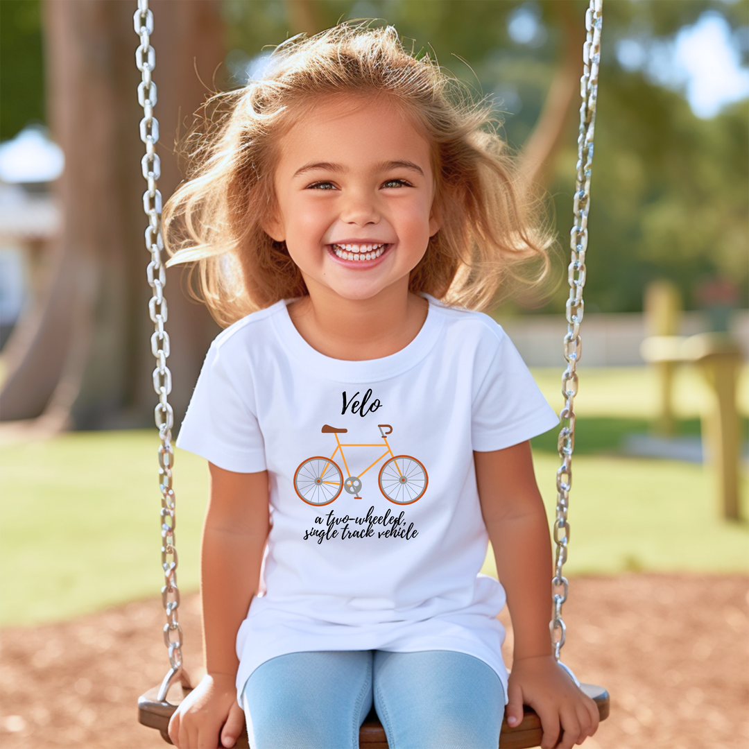 Vélo. A two-wheeled single track vehicle. T-shirts for toddlers and kids up for a biking adventure. - TeesForToddlersandKids -  t-shirt - biking - velo-a-two-wheeled-single-track-vehicle-short-sleeve-t-shirt-for-toddler-and-kids-the-biking-series