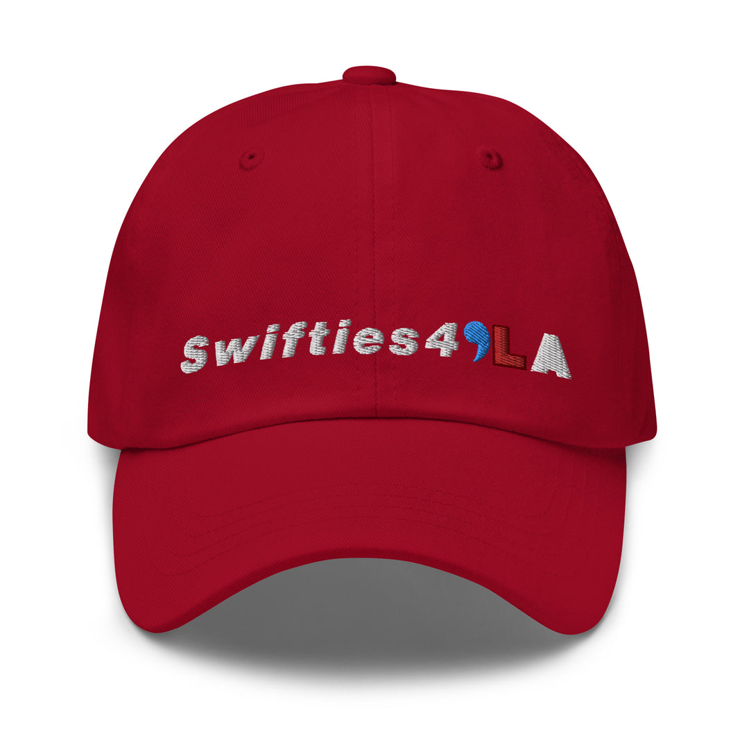 swifts for kamala in red baseball cap