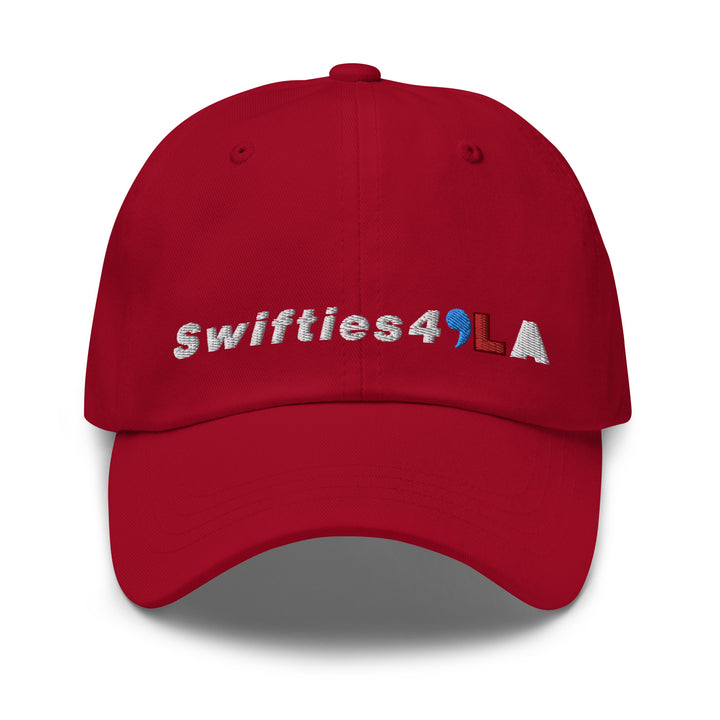 swifts for kamala in red baseball cap